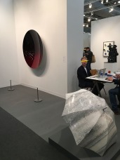 Anish Kapoor, "Mirror (Black to Red Brandy Wine)"; Ai Weiwei, "Shelter"